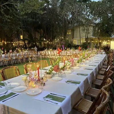 Long banquet tables set for a private dinner