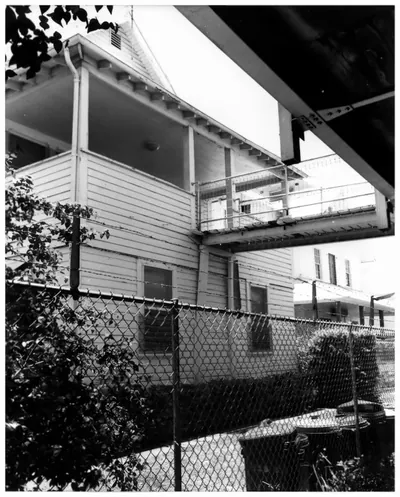 Archival photograph of a house and its porch